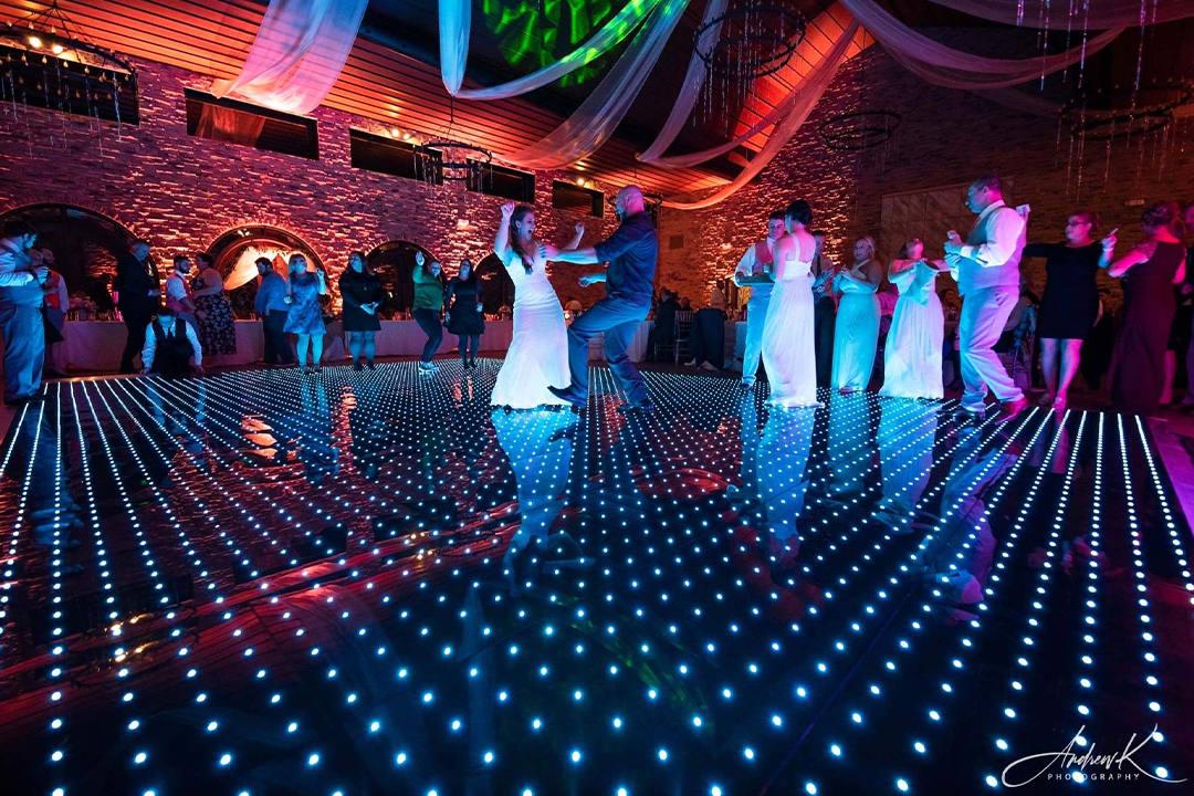 Black Tie Entertainment at up lighting table Guy's Party Center